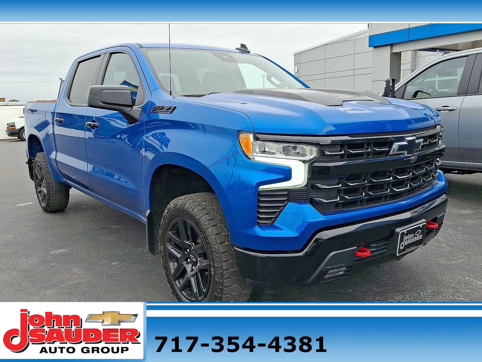 2023 Chevrolet Silverado 1500 LT Trail Boss in Glacier Blue Metallic — front three-quarter view